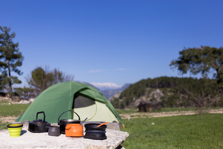 Camping in the mountains on a sunny day.の写真素材
