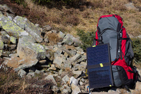 Camping items of equipment on a sunny day in the mountains.の写真素材