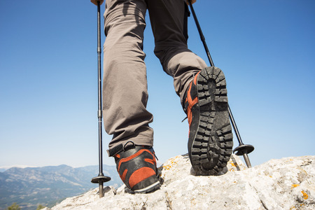 Hiking in the mountains on a sunny day.の写真素材