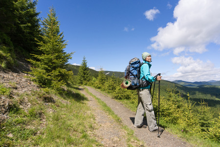 Summer hiking in the mountains on a sunny day.の写真素材
