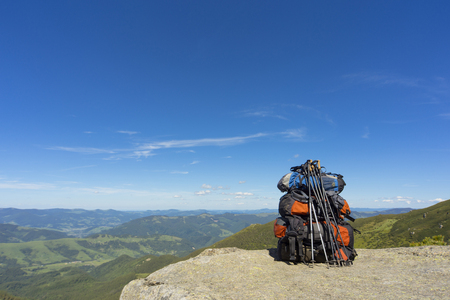 Camping with backpacks in the mountains with views of the mountaの写真素材