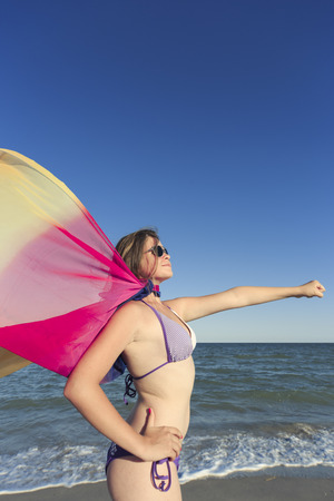 Girl on summer vacation on the beach.の写真素材