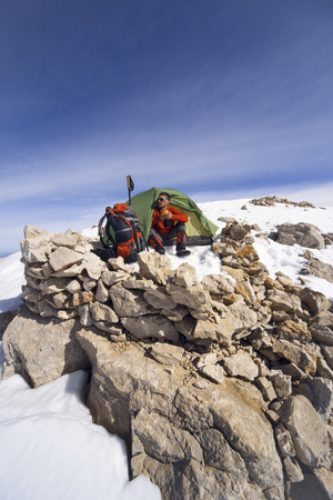 Camping on the top of the mountain in winter.の写真素材