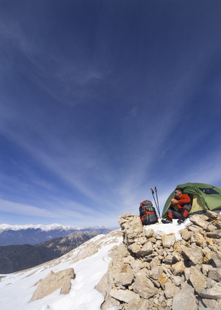 Camping on the top of the mountain in winter.の写真素材