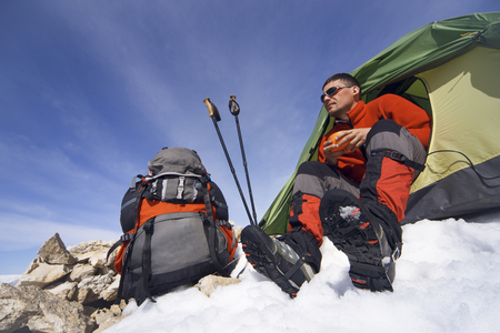 Camping on the top of the mountain in winter.の写真素材