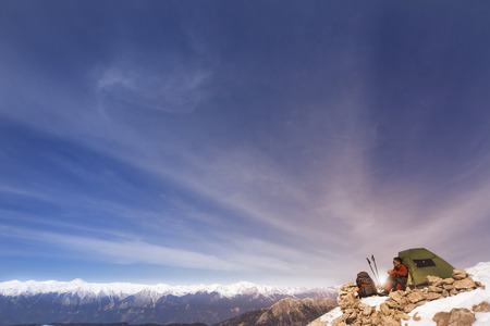 Camping on the top of the mountain in winter.の写真素材