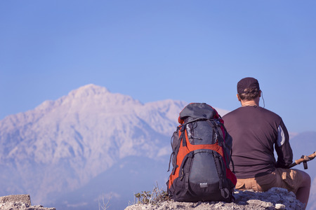 Summer hiking in the mountains with a backpack .の写真素材