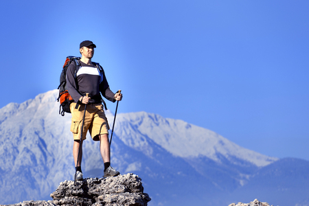 Summer hiking in the mountains with a backpack .の写真素材