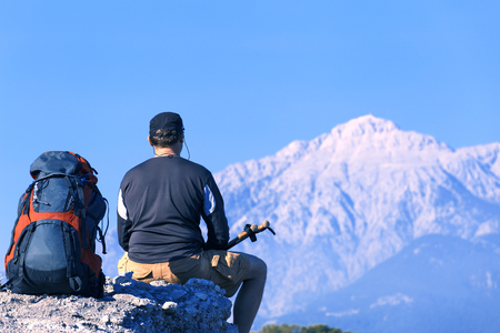Summer hiking in the mountains with a backpack .の写真素材