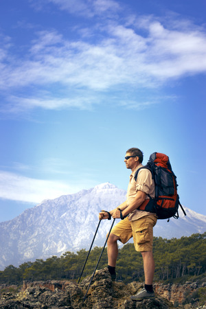 Summer hiking in the mountains with a backpack .の写真素材