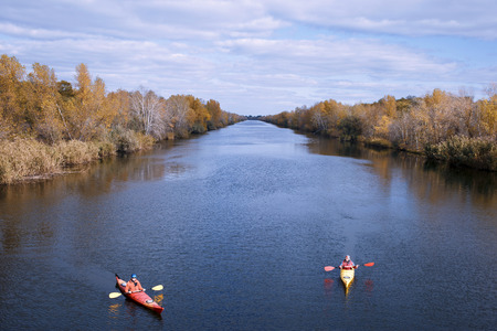 Journey down the river on a sunny day in a canoe.の写真素材
