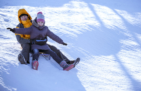 Driving in the snow on a sled in the winter.の写真素材