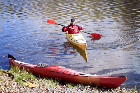 Journey down the river on a sunny day in a canoe.の写真素材