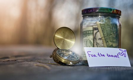 Accumulation of money in the piggy bank for travel.の写真素材