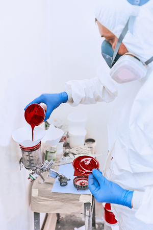 Preparing the paint for auto painting on the service.の写真素材