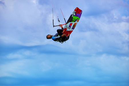 Kite Surfing on waves at sea in summer.の写真素材