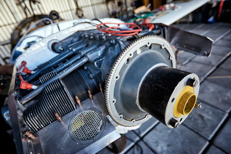 Light  single-engine aircraft for maintenance of the engine in the hangar .の写真素材