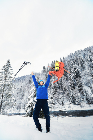 Winter trek high in the mountains with a backpack.の写真素材