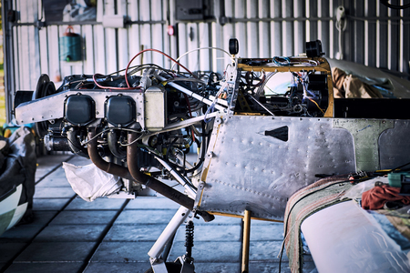 Light  single-engine aircraft for maintenance of the engine in the hangar .の写真素材