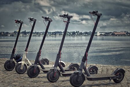 The electric scooter is the most eco-friendly modern urban transport every day.の写真素材