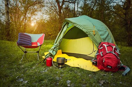 Camping in the forest on a beautiful meadow in spring.の写真素材