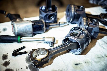 Removal and repair of a turbodiesel engine in a service center.の写真素材