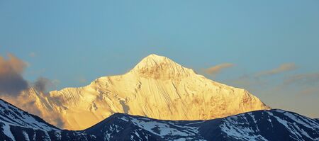 Beautiful landscape in the mountains with snow-capped peaks in the Himalayan mountains.の写真素材