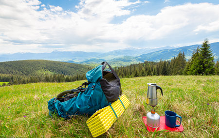 Hiking in the mountains with a backpack.の写真素材