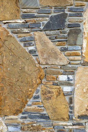 Stone wall texture in daylight. Banner background, backdrop or texture.の写真素材