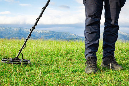 Search for coins with a metal detector. Search for ancient treasures.の写真素材