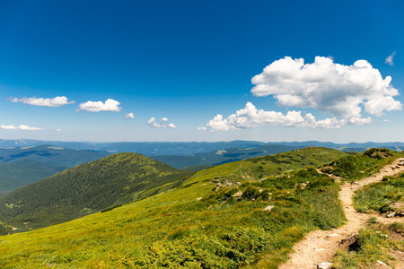 The most beautiful landscape with peaks in the background, sky with clouds on a sunny day.の写真素材