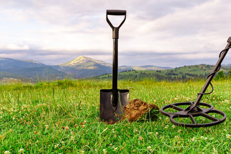 Search for coins with a metal detector. Search for ancient treasures.の写真素材