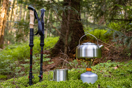 A kettle on the fire during a hike in the mountains.の写真素材