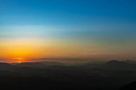 Sunset on the top of the mountain, mountain peaks on the background of the mountain landscape.の写真素材