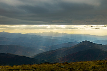 The most beautiful landscape with peaks in the background, sky with clouds at sunset.の写真素材
