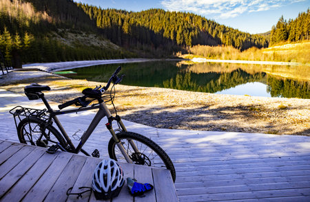 Cycling with cycling gloves and a helmet on a sunny day.の写真素材