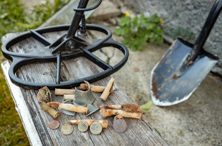 The result of searching for coins using a metal detector and a shovel.の写真素材