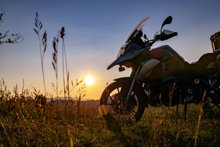 Moto trip to the mountains. Sunset in the mountains.の写真素材