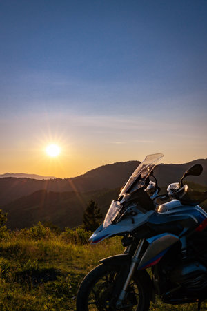 Moto trip to the mountains. Sunset in the mountains.の写真素材