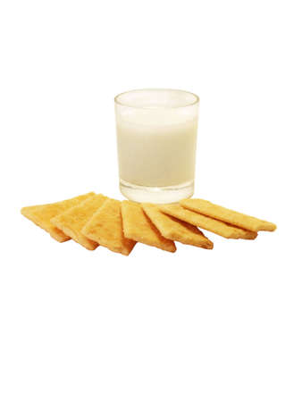 Golden biscuits with glass of milk