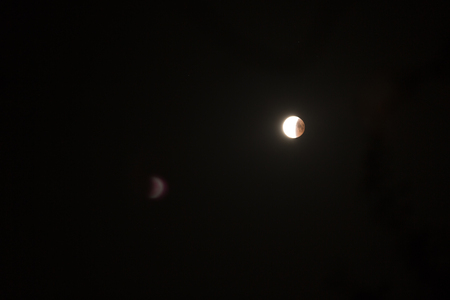 longest lunar eclipse of the century. The moon on the black sky.