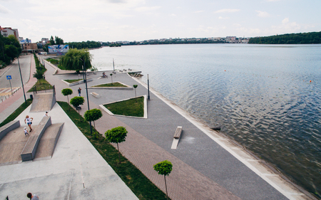 Aerial view from above on the skate park near the lake. Health zone.の写真素材