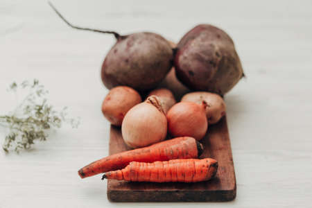 Fresh and Bright Vegetables Lie on the Kitchen Table