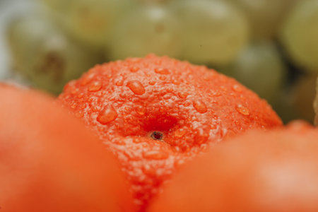 Close Up Orange With Water Droplets on the Peel