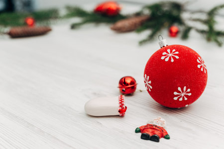 Christmas Decorations on a White Wooden Table with Copy Spaceの写真素材