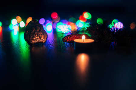 Christmas Composition of Church Icon on a Wooden Background With Multicolored Bokenの写真素材
