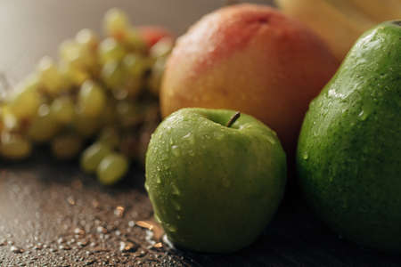 Apple Close Up With Water Droplets on the Peelの写真素材