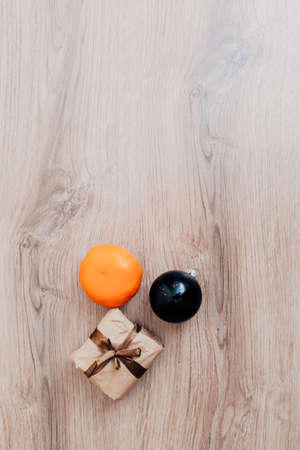 Christmas Tree Branches and on a Wooden Background with Copy Space