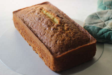 A loaf of home baked vanilla cake. It is also called yellow cake or butter cake or tea cake. Shot on...