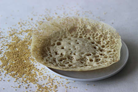 Hoppers made with foxtail millets. An experimental version of a popular Kerala dish called Appam. Shot on white background.の写真素材